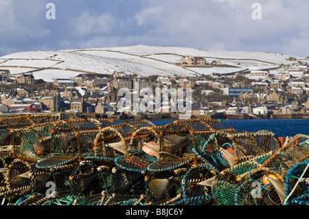dh Hamnavoe harbours STROMNESS HARBOUR ORKNEY SCOTLAND Crab pot lobster creels snow pots baskets quay island Stock Photo
