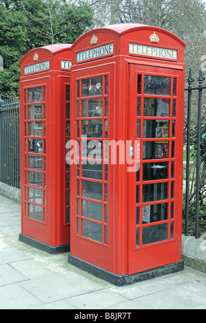 Two traditional red telephone boxes Russel Square London England UK Stock Photo