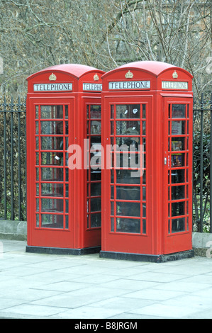 Two traditional red telephone boxes Russel Square London England UK Stock Photo