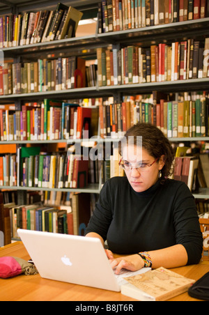 student working at computer in university library Stock Photo
