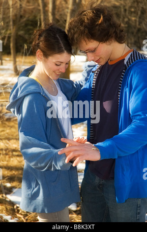 Happy teenage couple in the park Stock Photo