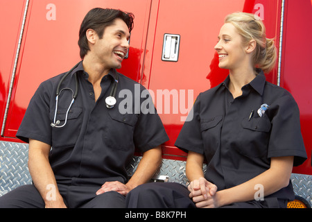 Two paramedics laughing together Stock Photo