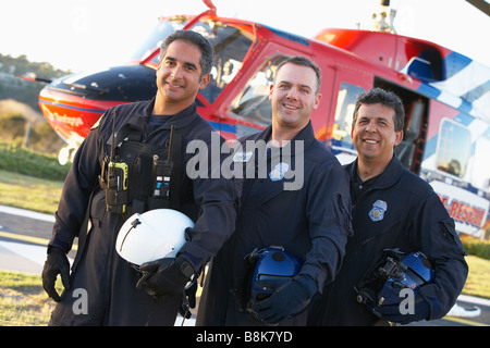 Portrait of paramedics standing in front of Medevac Stock Photo