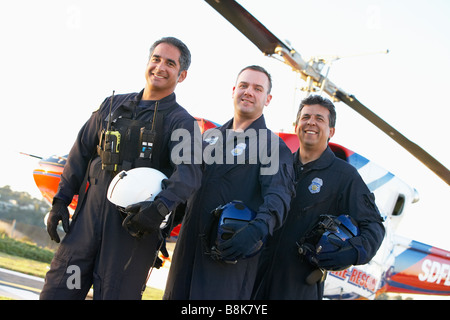 Portrait of paramedics standing in front of Medevac Stock Photo