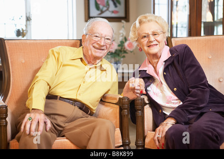 Senior couple holding hands Stock Photo