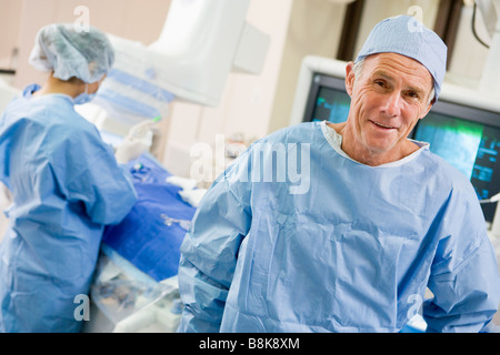 Surgeons In The Operating Room Stock Photo