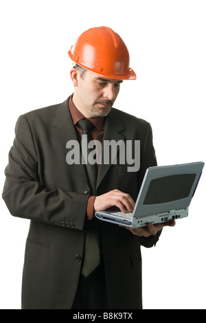 Engineer with a laptop isolated on white Stock Photo
