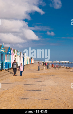 People walking along Southwold beach promenade on a nice day Stock Photo