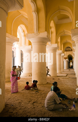 India Tamil Nadu Madurai Tirumalai Nayak Palace visitors in main hall collonade Stock Photo