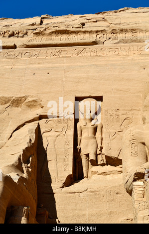 Reliefs of Ramses II worshiping Ra-Harakhti in the nitch above the entrance. Temple of Ramses II, Abu Simbel, Egypt  081123 3348 Stock Photo