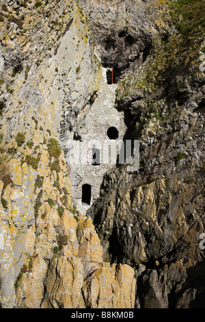 Culver Hole, an old Smugglers Hideout built into the Cliff Face, Port Eynon, Gower, South Wales, UK Stock Photo