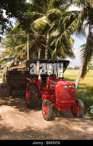 India Tamil Nadu Madurai Tidiyan Mahindra tractor parked in small rural farming village Stock Photo