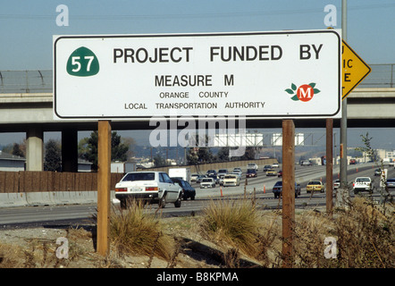 Project funded by Measure M sign shows tax dollars at work on highway construction project in California Stock Photo