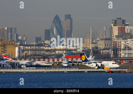 Overview on London City Airport with London's skyscrapers in background Stock Photo