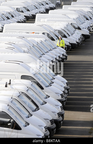 A WORKER WALKS AMONG LINES OF VANS AT THE LDV VAN FACTORY IN DREWS LANE,WASHWOOD HEATH,BIRMINGHAM,ENGLAND,UK Stock Photo