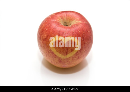 Fuji apple with a heart design on the skin Stock Photo