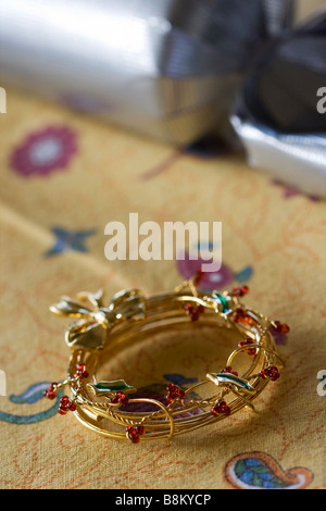 Christmas themed napkin holder lies on a table Stock Photo