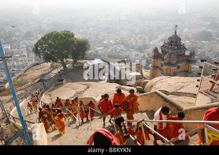 India Tamil Nadu Tiruchirappalli Rock Fort Temple pilgrims climbing steps up to hilltop shrine Stock Photo