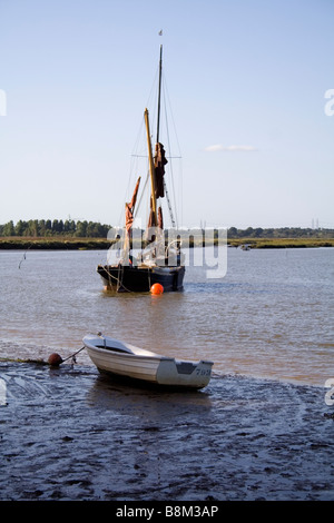 A Victorian spritsail sailing barge at anchor on the River Alde at Iken Reach Stock Photo