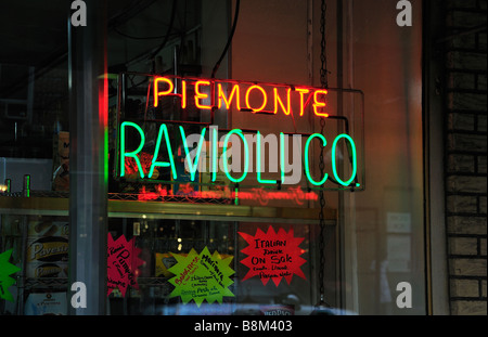 Neon sign in the window of a pasta factory in Little Italy, New York City. Stock Photo