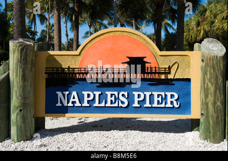 Sign for Naples Pier at Naples Beach, Gulf Coast, Florida, USA Stock Photo