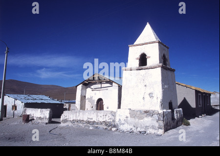 White painted church and main square in Enquelga, Isluga National Park, Chile Stock Photo