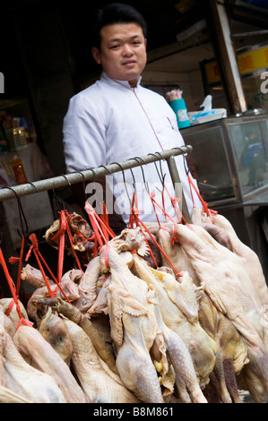 Chickens in a small market street in Nanjing. the chickens will be roasted or boiled in a traditional Chinese way. Stock Photo