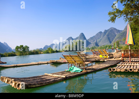 China Guangxi Province Guilin Yangshuo bamboo rafts on the Yulong River Stock Photo