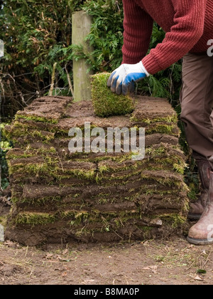 stacking cut turf Stock Photo