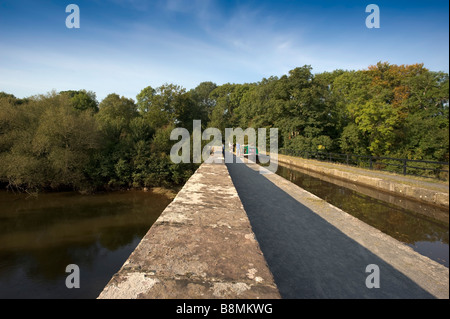 the towpath taff trail of the monmouthshire and brecon canal at brynich aqueduct over the river usk powys wales Stock Photo