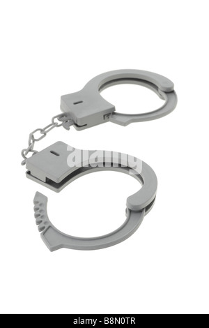 Toy plastic handcuff on white background Stock Photo