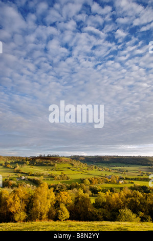 Rolling Cotswolds hills near Uley from Cam Long Down Cotswolds Gloucestershire England UK Stock Photo