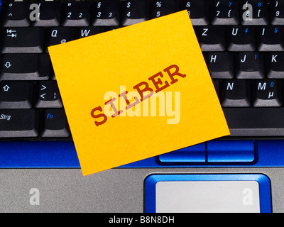 memo note on notebook, silver Stock Photo