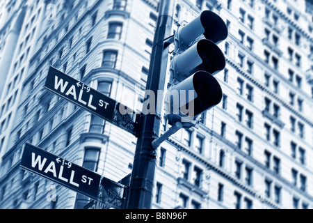 Traffic light and street signs on Wall street Manhattan Stock Photo