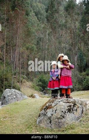 Three Indian girls in Peru's Cordillera Blanca. Stock Photo