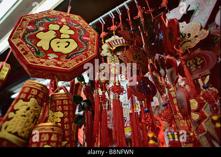 Chinese New Year decorations for sale outside stationery store Stanley Street Hong Kong Stock Photo
