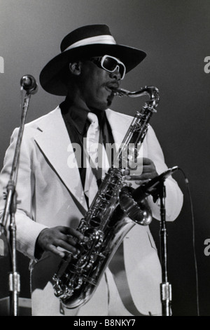 Clarence Clemons playing sax with Bruce Springsteen and the E-Street Band, playing at Seton Hall University, December 11, 1975 Stock Photo