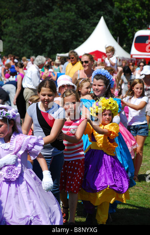 Some children enjoy the games at the Innocent Smoothie Summer Fete in Hyde Park, London Stock Photo