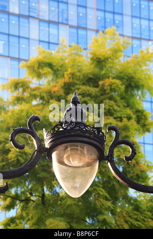 Lamp in the garden of St. Botolph without Bishopsgate City of London England Stock Photo