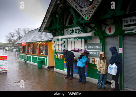 Sheltering from the rain Bowness On Windermere Stock Photo