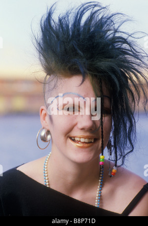 Punk teen girl with half shaved head and unusual black eye makeup Circa 1985 London 1980s UK HOMER SYKES Stock Photo