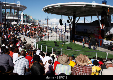 crowd watching a live band at the v&a waterfront amphitheater cape town south africa Stock Photo