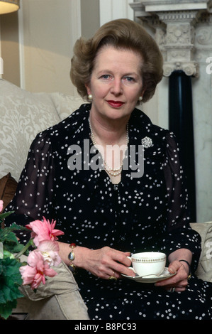 Prime Minister Margaret Thatcher private session in 10 Downing Street 1980s relaxing with cup of tea London England Stock Photo