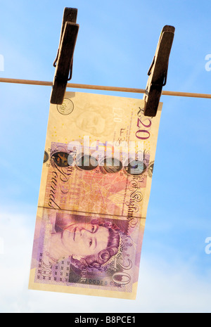 Twenty Pound Note Hanging from a Washing Line Stock Photo