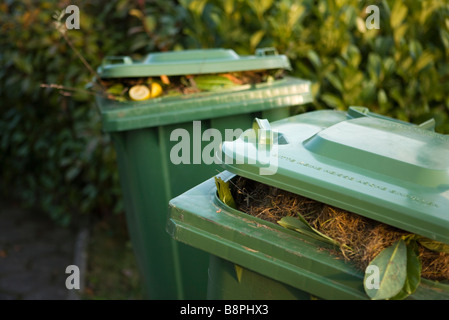 Garbage cans filled with compost Stock Photo