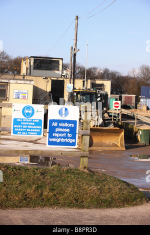 gravel quarry site entrance welcome board to cromwell quarry run by lefarge aggregates Stock Photo