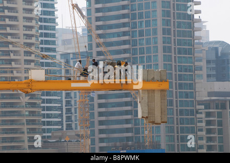 workmen on crane, dubai, uae Stock Photo