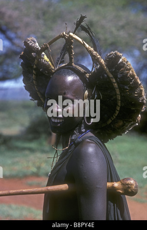 Portait of young Maasai moran with headdress of birds after circumcision South of Ngong Hills Kenya East Africa Stock Photo