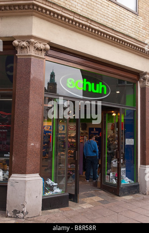 Schuh shoe shop store selling shoes and footwear in the city centre of Norwich,Norfolk,Uk Stock Photo