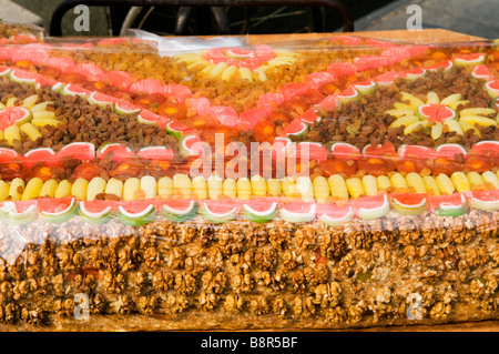 Nuts and Uygur sweets for sale. Stock Photo